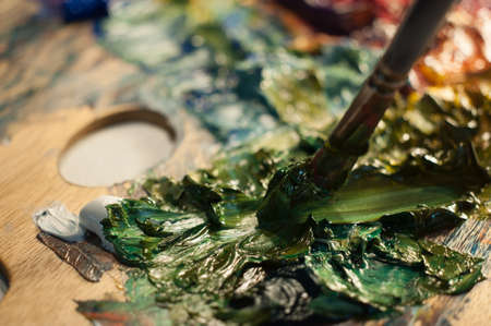 Artist Palette Artist oil colour palette mixing colour beautiful color mix creative art close up microの写真素材