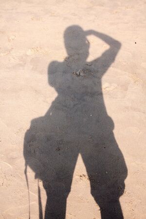 silhouette photographer on sand beachの写真素材