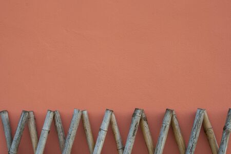 bamboo fence texture on pink background imageの写真素材