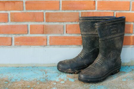 garden boot shoes with dirty mudの写真素材