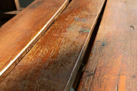 morning side-light of old wood chair image and textureの写真素材