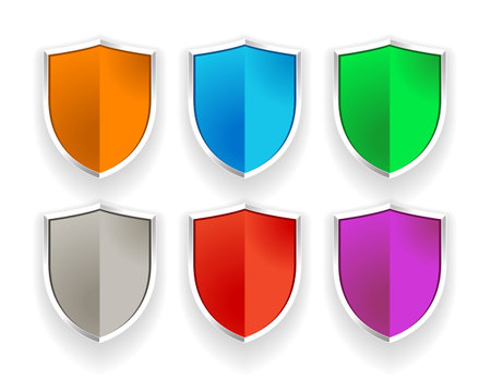 Set of different colour shield badges isolated on white. Security sign colour shapes with chrome outlines. Vector graphic.のイラスト素材