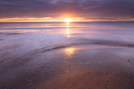 Beautiful sunrise of the Strait of Magellanの写真素材
