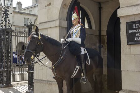 LONDON, UK - september 9, 2018: A member of the Queen's guard on horseback outside of Buckingham Palaceのeditorial素材