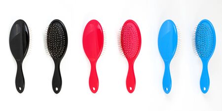 Beautiful trendy Big set of plastic hair brushes different color isolated on white background front and back viewの写真素材
