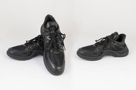 black leather sneakers shoes isolated on white background side and front viewの写真素材