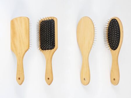 Set of different wooden hairbrushes isolated on white background front and back viewの写真素材