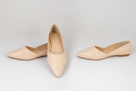 Beige female shoes, isolated on white background. top side viewの写真素材