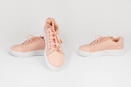 pink sneakers shoes isolated on white background side and front viewの写真素材