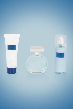 set of luxury perfume bottle with shower gel and body mist mockup on colorful backgroundの写真素材