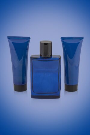 set of luxury perfume bottle with shower gel and body mist mockup on colorful backgroundの写真素材