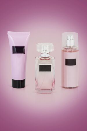 set of luxury perfume bottle with shower gel and body mist mockup on colorful backgroundの写真素材