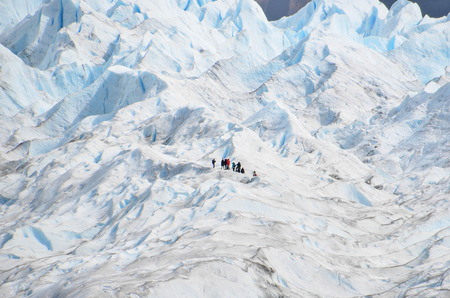 Trekkers on the glacierの写真素材