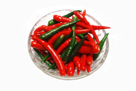 Red and green chili on white backgroundの写真素材