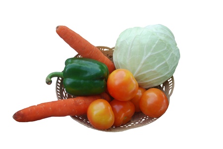 many vagetables in big basket on white backgroundの写真素材