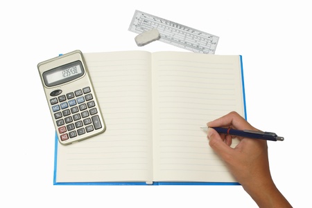 hand writing on notebook with Calculator and rulerの写真素材