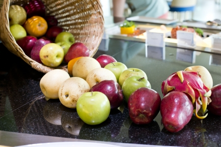 fruits and carrots in basketの写真素材