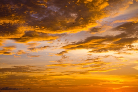 orange sky in sunset time by the beachの写真素材