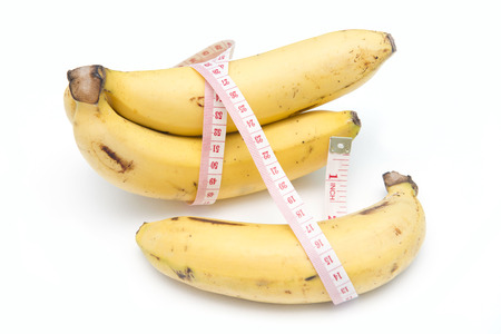 diet with banana, fruits for health isolate on white backgroundの写真素材