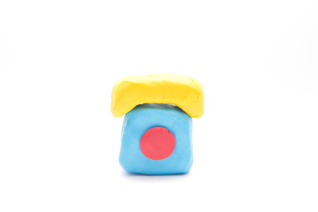 a little telephone made by clay isolate on white backgroundの写真素材