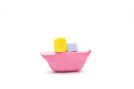 a little boat made by clay isolate on white backgroundの写真素材