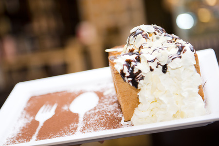 Honey toast with ice-cream and whipped creamの写真素材