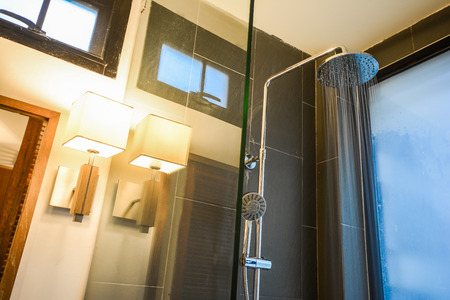 water flow from rain shower in bathroom, designのeditorial素材