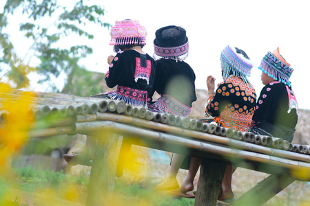 Chiang Mai, Thailand-Oct 26 : Cute Thai tribal kids in Mae Jam mountain She is local guides for tourist, on October 26,2014 in Chiang Mai : Thailandのeditorial素材