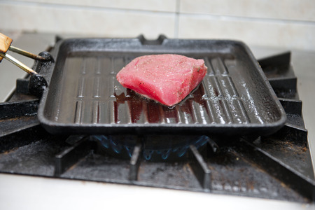 Chef is grilled tuna on pan, cookの写真素材