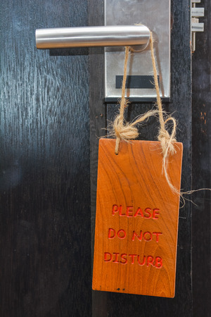 please do not disturb sign on wood, doorの写真素材