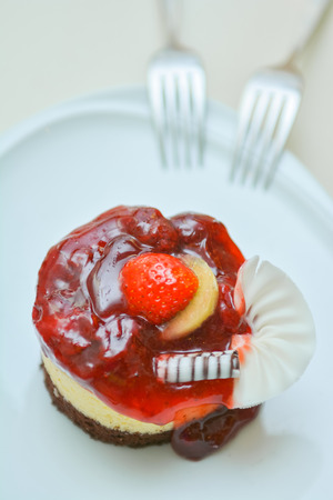 strawberry cheesecake delicious cake in cafe, dessertの写真素材