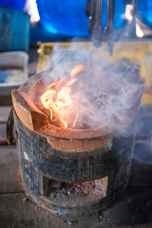 antique stove for traditional cooking, Thailand, fireの写真素材