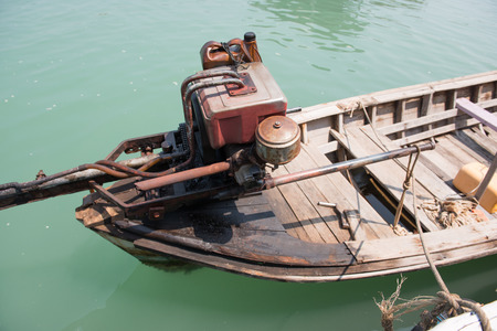 traditional longtail boat on the sea of green, bayの写真素材
