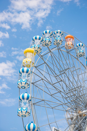 ferris wheel with blue sky, funの写真素材