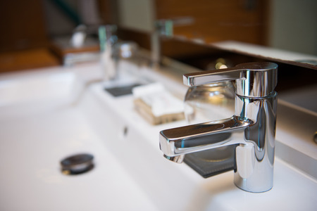 Modern washbasin in a luxury hotel, restroomの写真素材