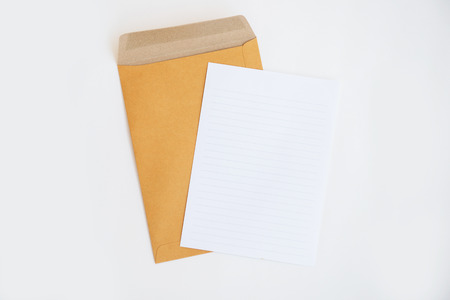 brown envelope and paper note isolate on white background, stationeryの写真素材