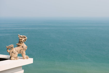 Lion statues with sea view , oceanの写真素材
