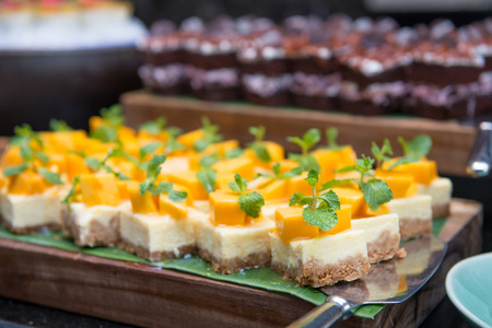 delicious cheesecake with fresh mango on top, dessertの写真素材