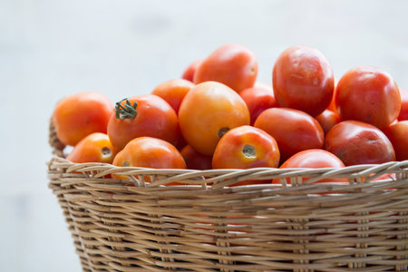 fresh tomato in basket, vegetableの写真素材