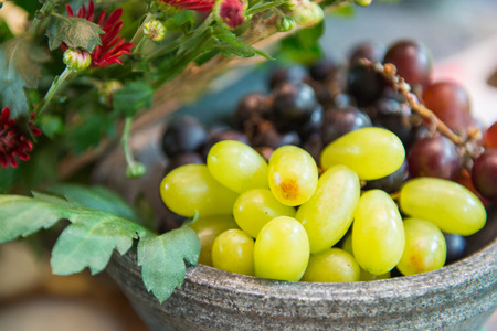 fresh grapes in a stone bowl, fruitの写真素材
