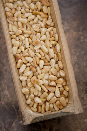 dry nuts in bamboo tube, organicの写真素材