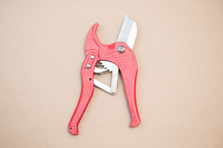 red tool for Cutting the cord, electricityの写真素材