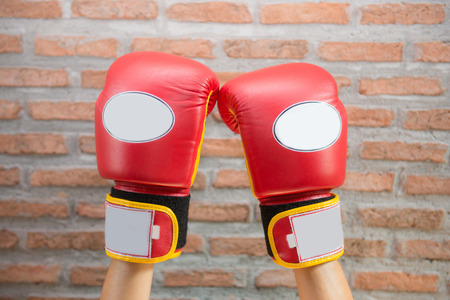 Red Boxing Gloves "MUAY THAI" for fight, gymnasiumの写真素材
