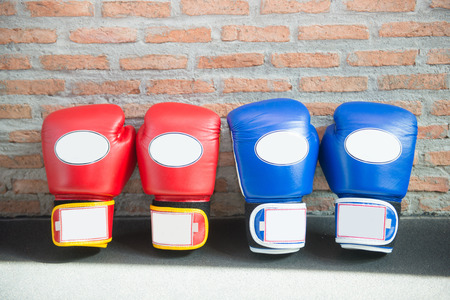 Red Boxing Gloves "MUAY THAI" for fight, gymnasiumの写真素材