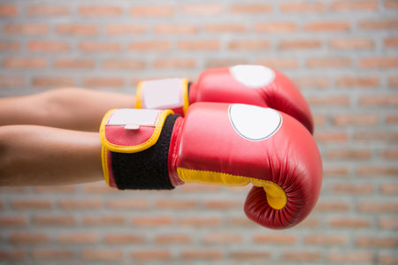 Red Boxing Gloves "MUAY THAI" for fight, sportの写真素材