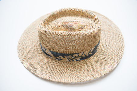brown straw hat on white table, head-dressの写真素材