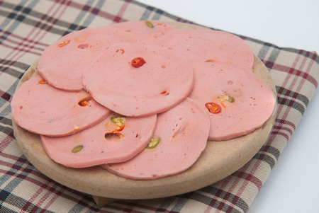 pork ham slices with fresh peppers, foodの写真素材