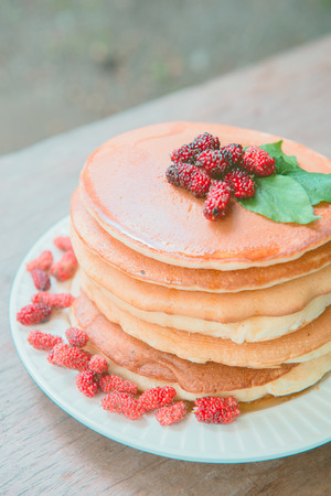 Delicious pancakes with fresh mulberry and honey, dessertの写真素材