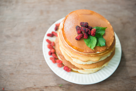 Delicious pancakes with fresh mulberry and honey, dessertの写真素材