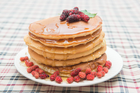 Delicious pancakes with fresh mulberry and honey, dessertの写真素材
